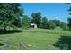 View of barn and surrounding property showcasing the expansive, well-maintained land at 157 Blackberry Ln, Taylorsville, NC 28681