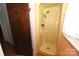 Bathroom features a small yellow shower with a detachable shower head for ease of cleaning at 157 Blackberry Ln, Taylorsville, NC 28681