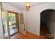 Foyer with wood flooring and glass doors leading to outdoor patio at 157 Blackberry Ln, Taylorsville, NC 28681