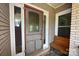 Charming front door featuring decorative glass detail and wood trim at 157 Blackberry Ln, Taylorsville, NC 28681