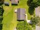 Aerial view of home showing roof, deck, driveway, landscaping, yard and surrounding neighborhood at 1675 Old Lynwood Cir, Lancaster, SC 29720