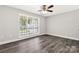 Bedroom featuring neutral paint, a ceiling fan, and a window with blinds at 1675 Old Lynwood Cir, Lancaster, SC 29720