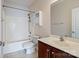 Bathroom with white shower and white sink with neutral flooring at 1812 Mill Chase Ln, Waxhaw, NC 28173