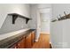 Functional mudroom with custom cabinetry, wood floors, and convenient storage options at 1812 Mill Chase Ln, Waxhaw, NC 28173