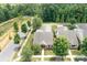 A desirable neighborhood showcases the home’s great location, a neatly maintained lawn, and lush landscaping at 18236 Coulter Pkwy, Cornelius, NC 28031