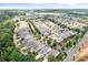 Drone shot showcasing neighborhood with tree-lined streets and well-maintained homes at 18236 Coulter Pkwy, Cornelius, NC 28031