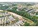 Aerial view of a new residential neighborhood featuring homes, amenities, and natural surroundings at 18236 Coulter Pkwy, Cornelius, NC 28031