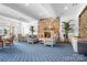 Comfortable clubhouse interior with a stone fireplace and cozy seating arrangements at 18236 Coulter Pkwy, Cornelius, NC 28031