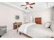 Spacious main bedroom with tray ceiling, sitting area, and neutral color palette at 18236 Coulter Pkwy, Cornelius, NC 28031