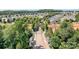 Aerial view of the community's entrance with beautiful landscaping and a welcoming atmosphere at 18236 Coulter Pkwy, Cornelius, NC 28031