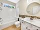 Bathroom featuring a tub, a white vanity, and a decorative backsplash at 2027 Brook View Ct, Matthews, NC 28104