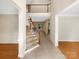 Grand two-story foyer with staircase, tile flooring, and views of the living spaces at 2027 Brook View Ct, Matthews, NC 28104