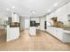 Spacious kitchen with white cabinets, granite countertops, and stainless steel appliances at 2027 Brook View Ct, Matthews, NC 28104