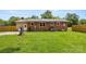 A sprawling backyard with well-kept grass and ample space provides opportunities for outdoor recreation and gatherings at 2476 Cane Mill Rd, Lancaster, SC 29720