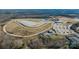 Aerial view of property with BMX track, parking lots, athletic fields, and school at 257 Auburn View Rd, Rock Hill, SC 29730