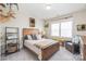 Comfortable bedroom with a wooden bed frame, animal-themed decor, and natural light, creating a rustic retreat at 257 Auburn View Rd, Rock Hill, SC 29730