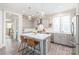 Modern kitchen with stainless steel appliances, white countertops, and stylish bar seating at 257 Auburn View Rd, Rock Hill, SC 29730