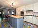 Kitchen showcases butcher block island, stainless oven, and tiled backsplash in a cozy space at 2915 Old Stage Rd, Gastonia, NC 28052