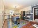 Charming kitchen featuring stainless appliances, butcher block island, and stylishly patterned floor mat at 2915 Old Stage Rd, Gastonia, NC 28052