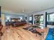 Spacious main bedroom with wood floors, large windows and a sliding glass door to the private deck at 2915 Old Stage Rd, Gastonia, NC 28052