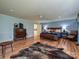 Spacious main bedroom with wood floors, large windows, and a sitting area for relaxing at 2915 Old Stage Rd, Gastonia, NC 28052