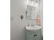 Small bathroom featuring a mirror and vanity with light blue cabinets at 3035 Florida Ave, Charlotte, NC 28205