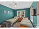 Bright bedroom featuring twin beds, ample natural light, and tasteful decorations at 3035 Florida Ave, Charlotte, NC 28205
