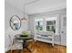 Dining space features hardwood floors, table set with an adjacent view to the outdoors at 3035 Florida Ave, Charlotte, NC 28205
