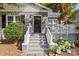 Inviting front entrance with stone steps, brick facade, and well-manicured landscaping at 3035 Florida Ave, Charlotte, NC 28205