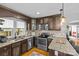 Updated kitchen with stainless appliances, granite countertops, and plenty of cabinet storage at 3035 Florida Ave, Charlotte, NC 28205