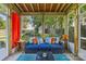 Inviting screened porch with comfortable seating and a view of the backyard at 3035 Florida Ave, Charlotte, NC 28205