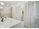 Bathroom with double vanity and closet at 3135 Lake Shore S Rd, Denver, NC 28037