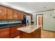 Traditional kitchen features custom wood cabinets, granite countertops, stainless steel appliances and hardwood floors at 3135 Lake Shore S Rd, Denver, NC 28037