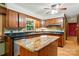 Traditional kitchen features custom wood cabinets, granite countertops, stainless steel appliances and an island at 3135 Lake Shore S Rd, Denver, NC 28037