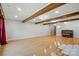 Open living room with wood beams and hardwood floors. Perfect for entertaining at 3135 Lake Shore S Rd, Denver, NC 28037
