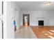 Inviting living room featuring a fireplace and combination tile and wood flooring at 317 Campus St, Charlotte, NC 28216