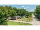 Charming single-story home with a lush green lawn, mature trees, and a welcoming facade in a desirable neighborhood at 318 W Peeler St, Salisbury, NC 28146