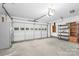 A spacious garage with ample storage and a functional garage door at 318 W Peeler St, Salisbury, NC 28146
