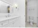 Bright bathroom featuring a glass door shower, white vanity and chrome finishes at 4032 Brandy Creek Ct, Clover, SC 29710