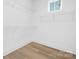 Empty walk-in closet space with wire shelving and wood floors at 4032 Brandy Creek Ct, Clover, SC 29710