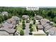 Aerial view of the home at 426 Kirkbride Ct, nestled in a neighborhood with tree-lined streets and manicured lawns at 426 Kirkbride Ct, Fort Mill, SC 29715