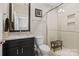 Modern bathroom featuring glass shower door, stone countertop, and modern fixtures at 426 Kirkbride Ct, Fort Mill, SC 29715