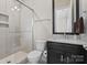 Stylish bathroom featuring glass shower, granite countertop and dark vanity providing a luxurious and functional space at 426 Kirkbride Ct, Fort Mill, SC 29715