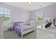 Bright bedroom with natural light, a comfortable bed, and a vanity area at 426 Kirkbride Ct, Fort Mill, SC 29715