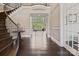 Bright foyer with a view into the living room and its large windows at 426 Kirkbride Ct, Fort Mill, SC 29715