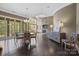 Open floor plan with living room, dining area, fireplace, and access to the outdoor patio at 426 Kirkbride Ct, Fort Mill, SC 29715