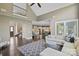 Open concept living room view into the kitchen, and staircase with dark hardwood floors at 426 Kirkbride Ct, Fort Mill, SC 29715