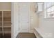 Bright mudroom features built-in bench, hooks, and shelving providing excellent storage and organization at 426 Kirkbride Ct, Fort Mill, SC 29715