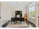 Cozy home office with a classic desk, built-in hutch, and natural light at 426 Kirkbride Ct, Fort Mill, SC 29715