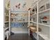 Well-organized walk-in pantry with ample shelving and storage solutions at 426 Kirkbride Ct, Fort Mill, SC 29715
